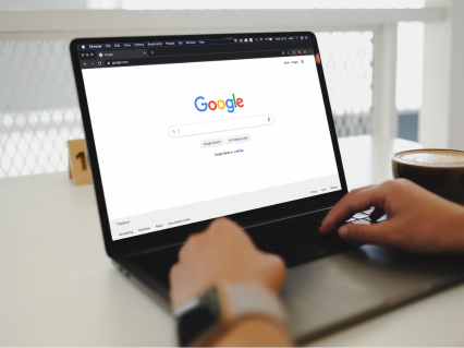 The image shows a open PC with google
